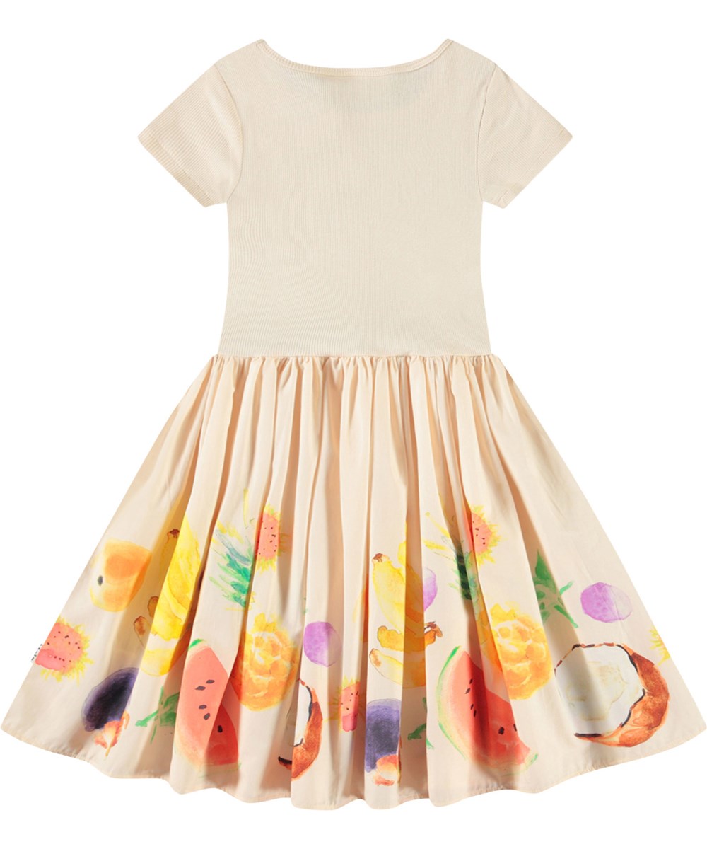 Cissa - Dancing Fruits - Beiges kurzärmeliges Kleid für Kinder aus Öko-Baumwolle mit einem eng anliegenden gerippten Jersey-Oberteil und einem Popeline-Rock.