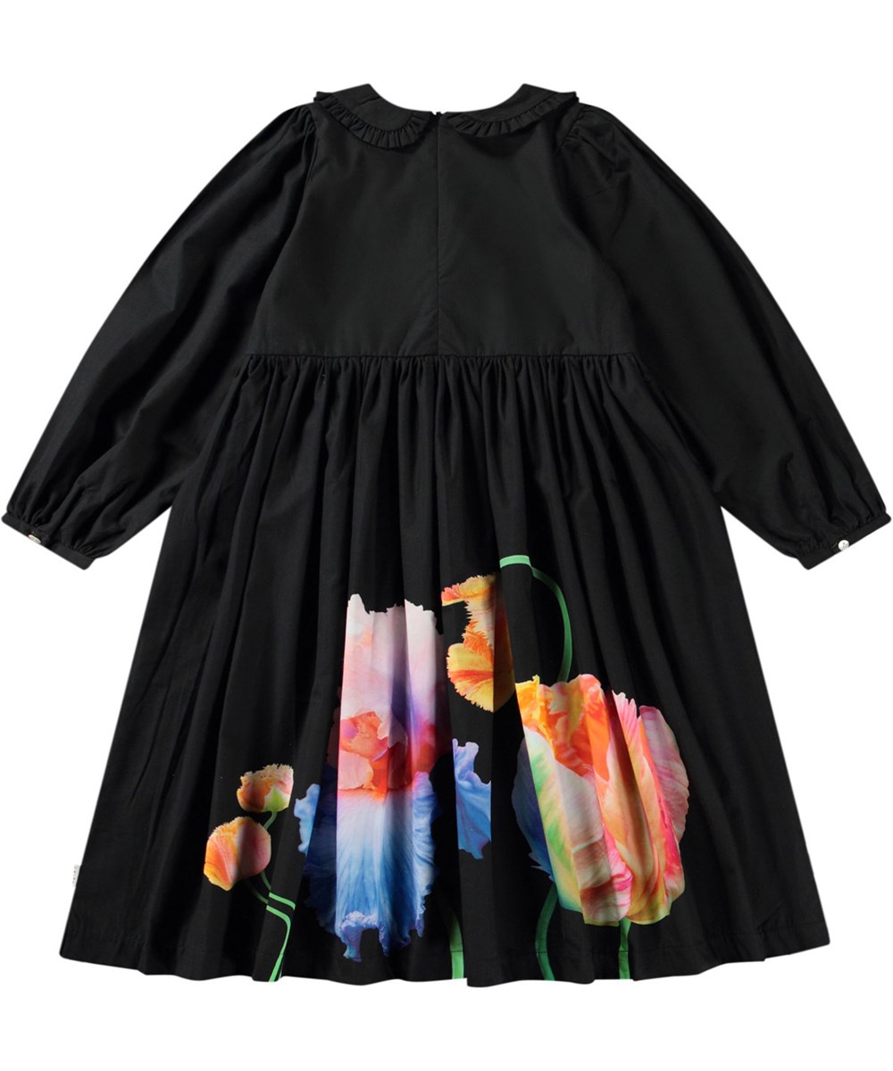 Corinne - Night Tulips - Schwarzes knielanges Kleid für Kinder aus Öko-Baumwolle mit Kragen und Rüschenkante.