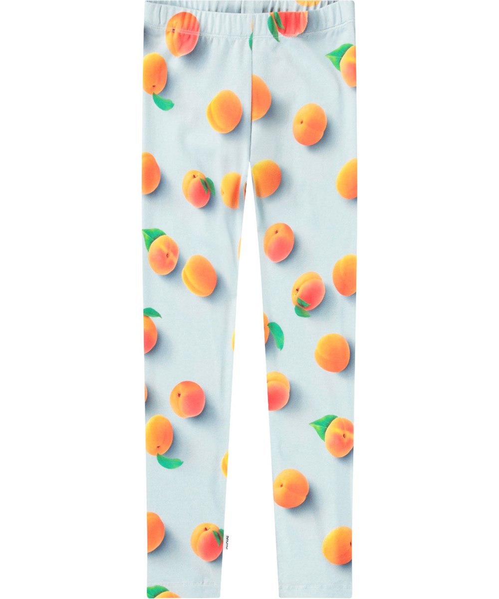 Niki - Fresh Apricots - Hellblaue Leggings mit Druck für Kinder aus dehnbarem Öko-Baumwolle mit einem elastischen Bund.