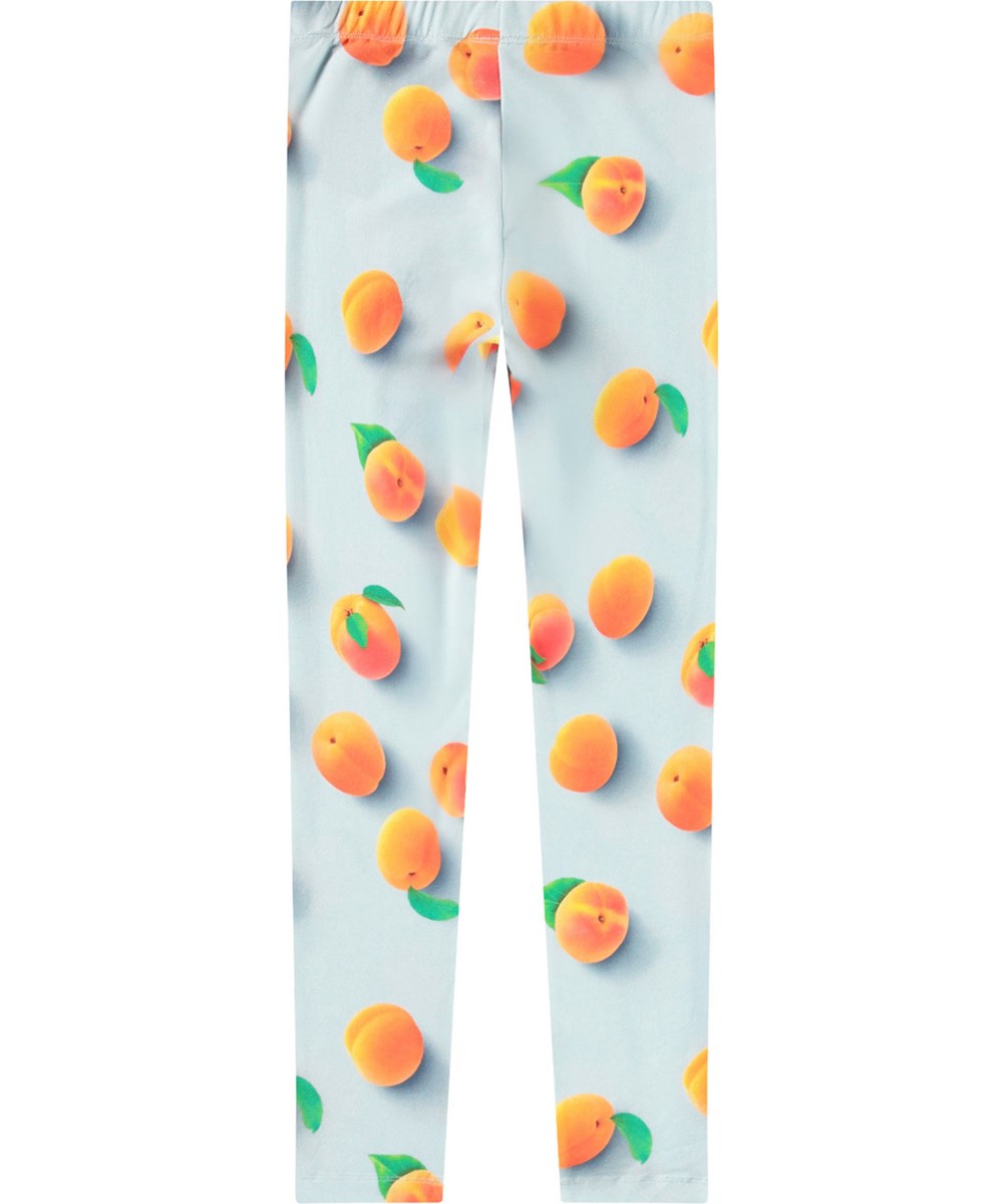 Niki - Fresh Apricots - Hellblaue Leggings mit Druck für Kinder aus dehnbarem Öko-Baumwolle mit einem elastischen Bund.