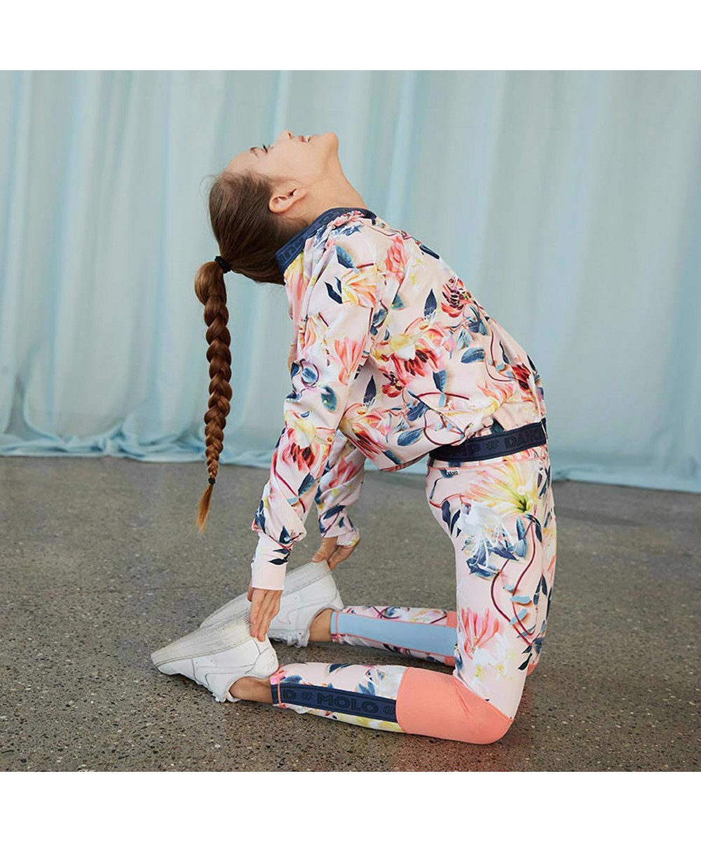 Olympia - Motion Flower - Hellrosa Sportleggings mit Blumenprint