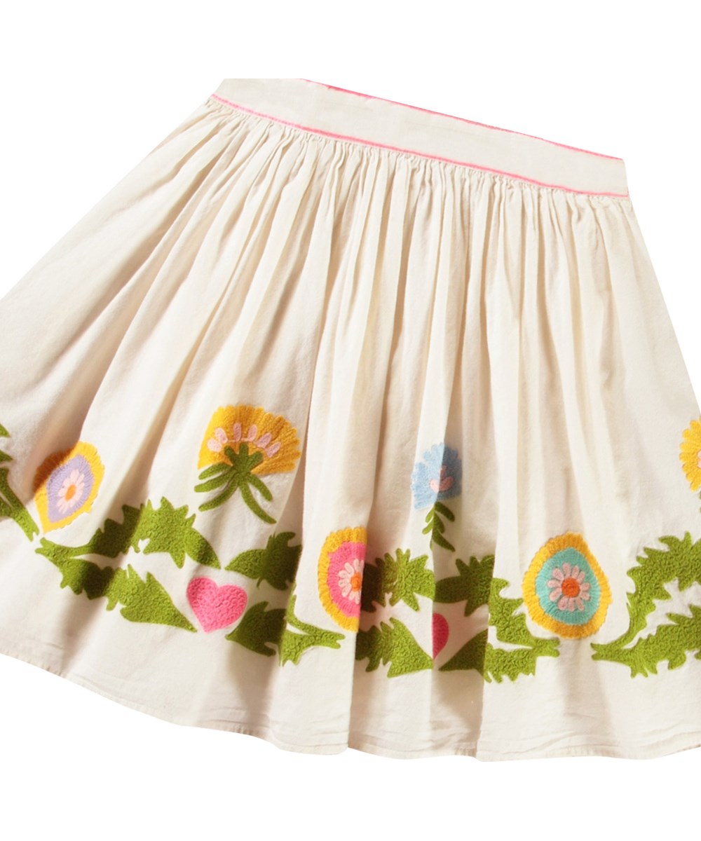 Bonnie - Dandelion Border - Hellrosa knielanger Baumwollrock mit rosa Streifen und bestickten Löwenzahnmotiven für Kinder.