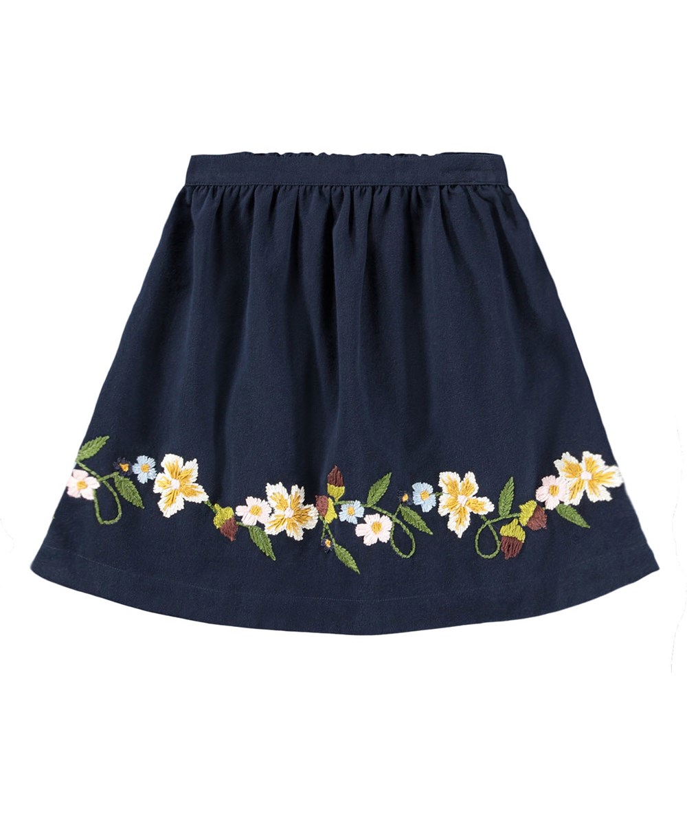Bonnie - Galaxy Blue - Dunkelblauer Rock für Kinder aus Baumwoll-Twill mit Stickerei von Blumen und Nüssen.