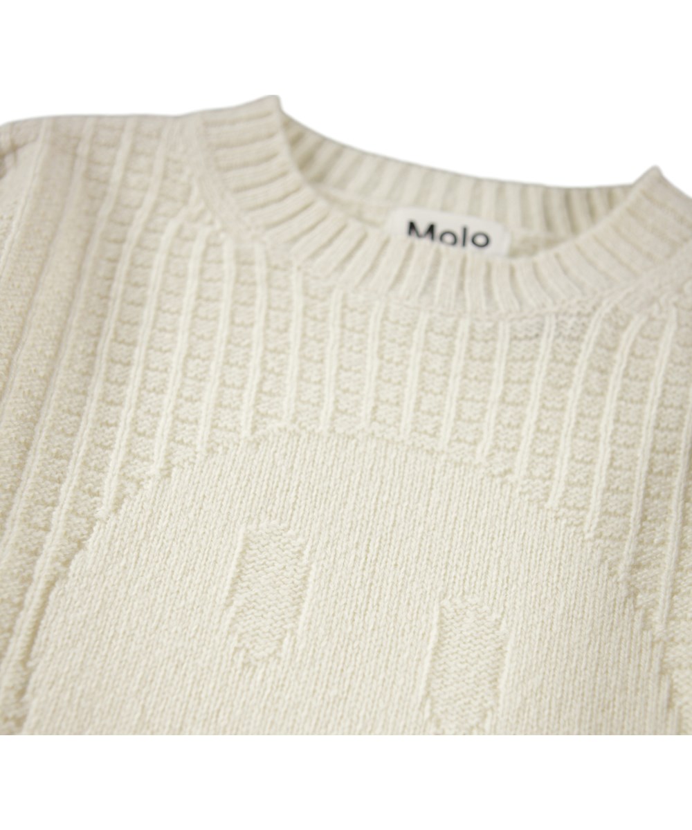 Griselda - Buttercream - Gestrickter creme-farbener Wollpullover für Kinder.