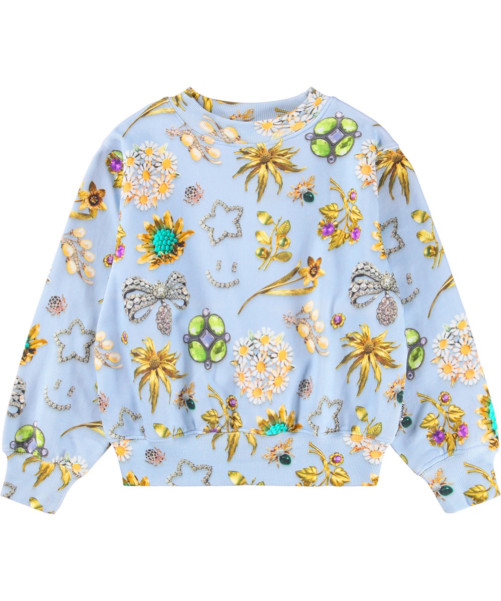 Marge - Royal Bling - Hellblaues Sweatshirt aus Öko-Baumwolle mit einem Aufdruck von schönen Schmuckstücken.