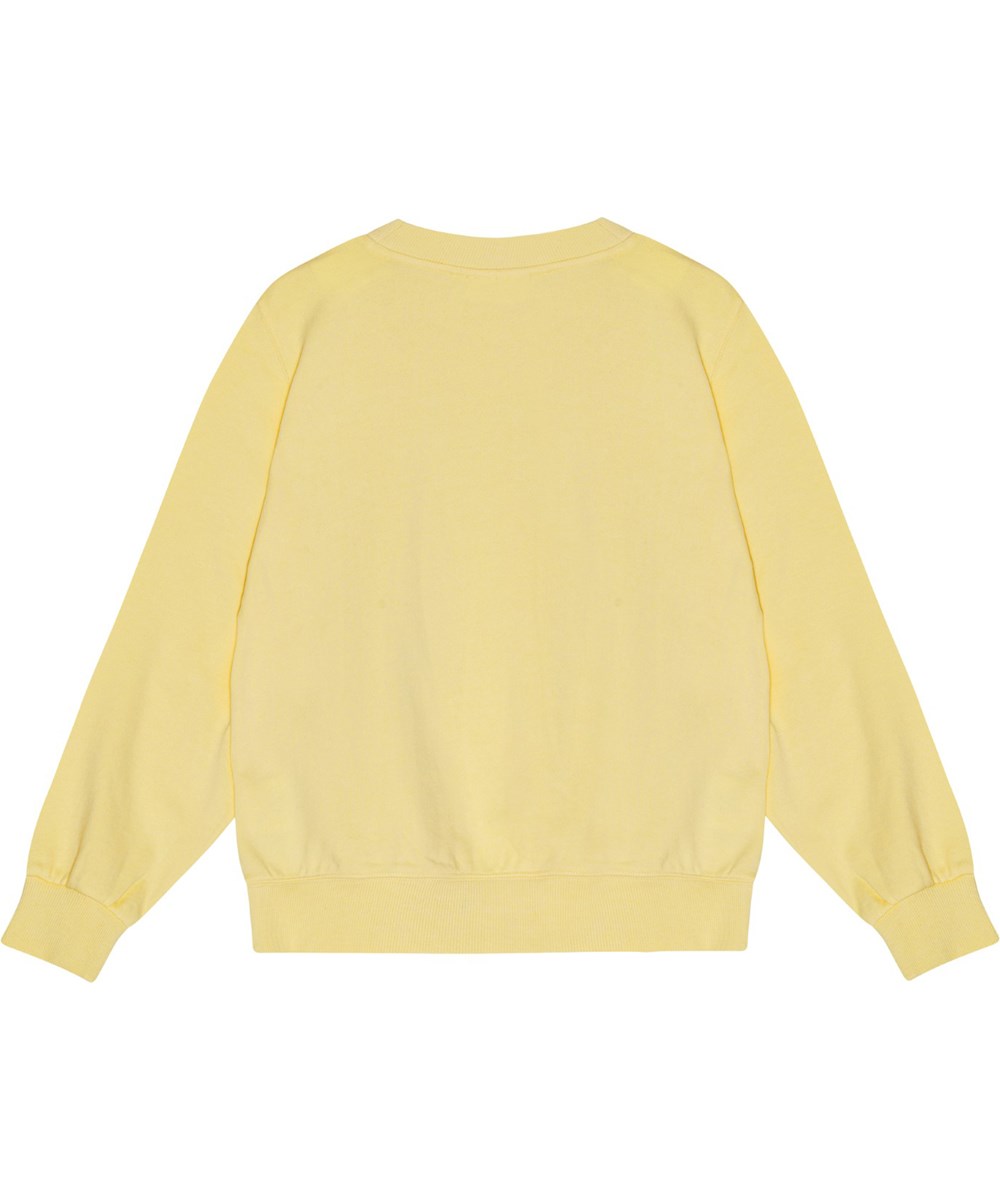 Marge - Sequin Bow - Hellgelbes Öko-Baumwoll-Sweatshirt mit übergroßem Schnitt und Pailletten-Schleifenstickerei.