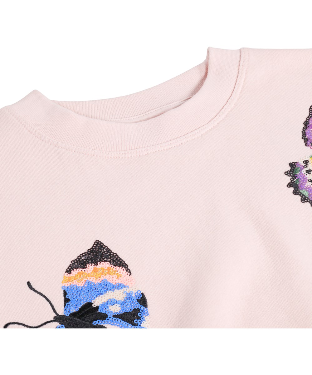 Marika - Cloud Pink - Rosa Sweatshirt für Kinder mit Paillettenstickerei und aus Bio-Baumwolle gefertigt.