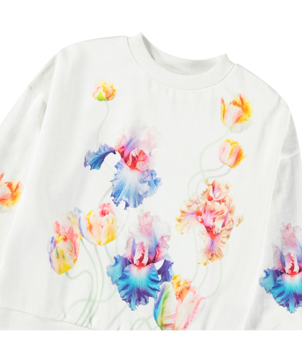 Maxi - Petals Galore - Weißer Pullover mit Druck für Kinder aus weicher Öko-Baumwolle mit gerippten Kanten am Hals, an den Ärmeln und am unteren Saum des Pullovers.