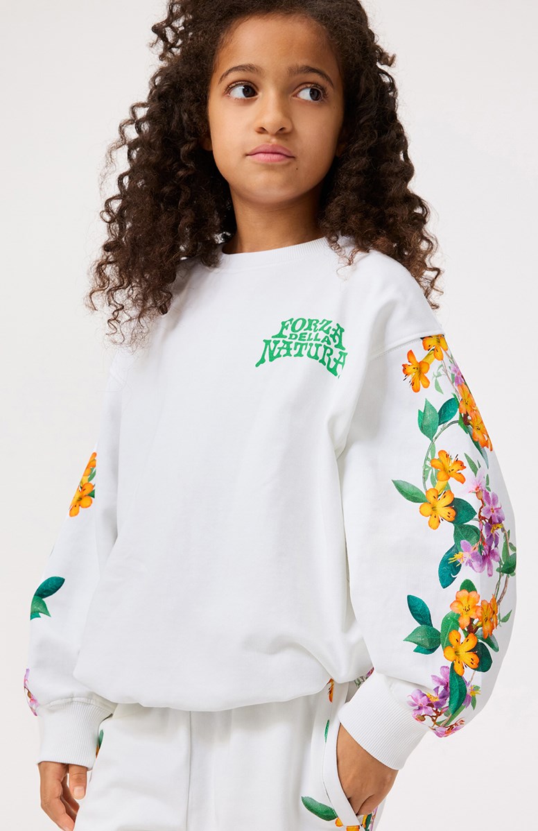 Monti - Jungle Flowers - Weißer Pullover mit Druck für Kinder aus weicher Öko-Baumwolle mit gerippten Kanten am Hals, an den Ärmeln und am unteren Saum des Pullovers.