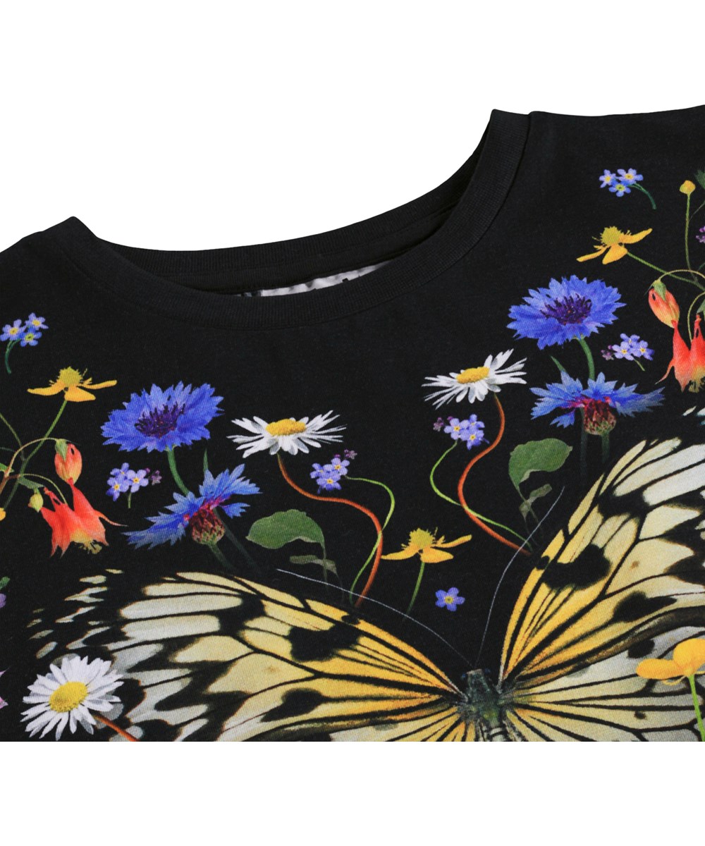 Raeesa - Nouveau Butterfly - Schwarzes T-Shirt für Kinder aus Öko-Baumwolle mit Blumenmuster