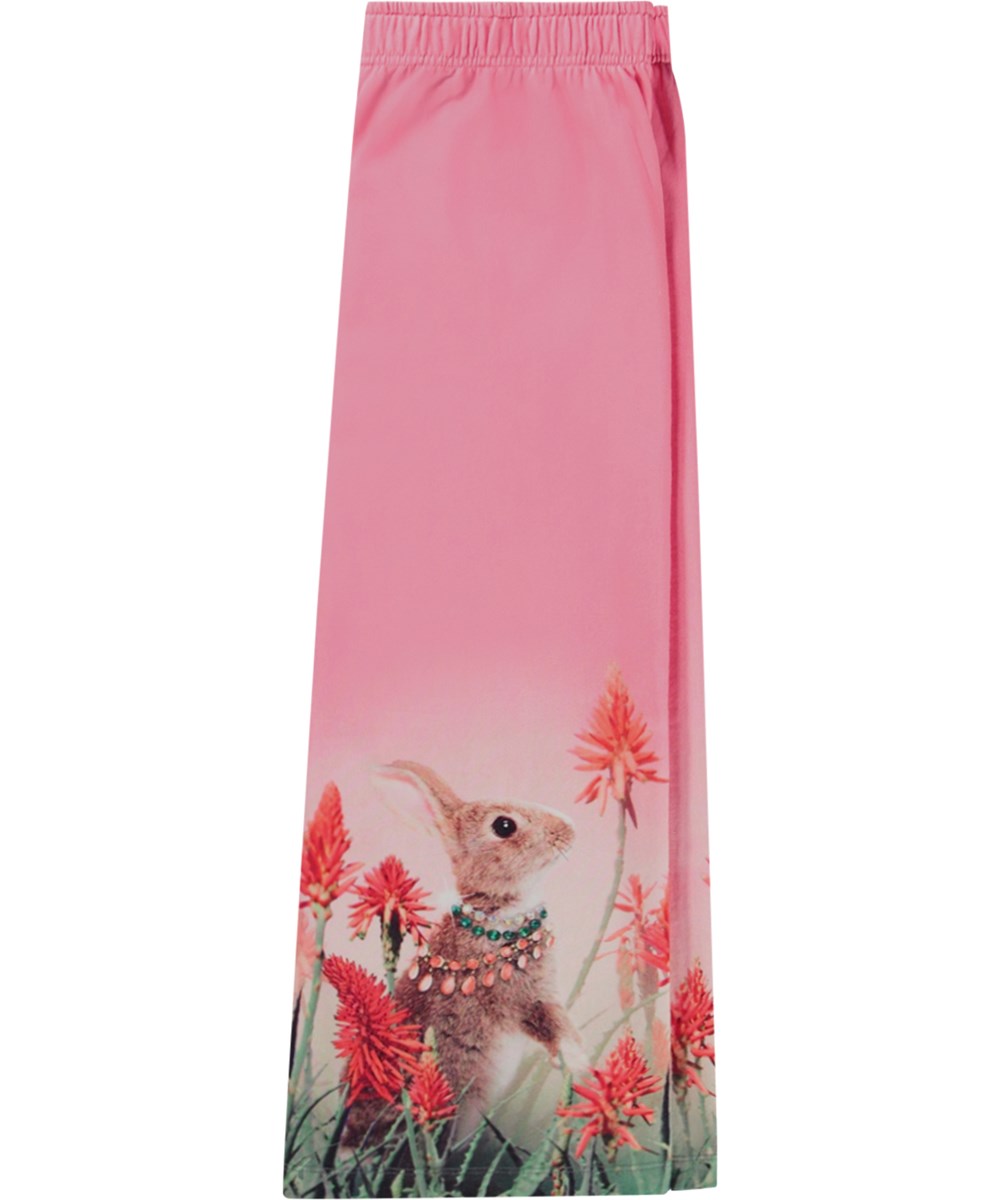 Aurita - Fancy Giraf - Roze joggingbroek van biologisch katoen met oranje bloemen-, giraffen- en konijnenprint.