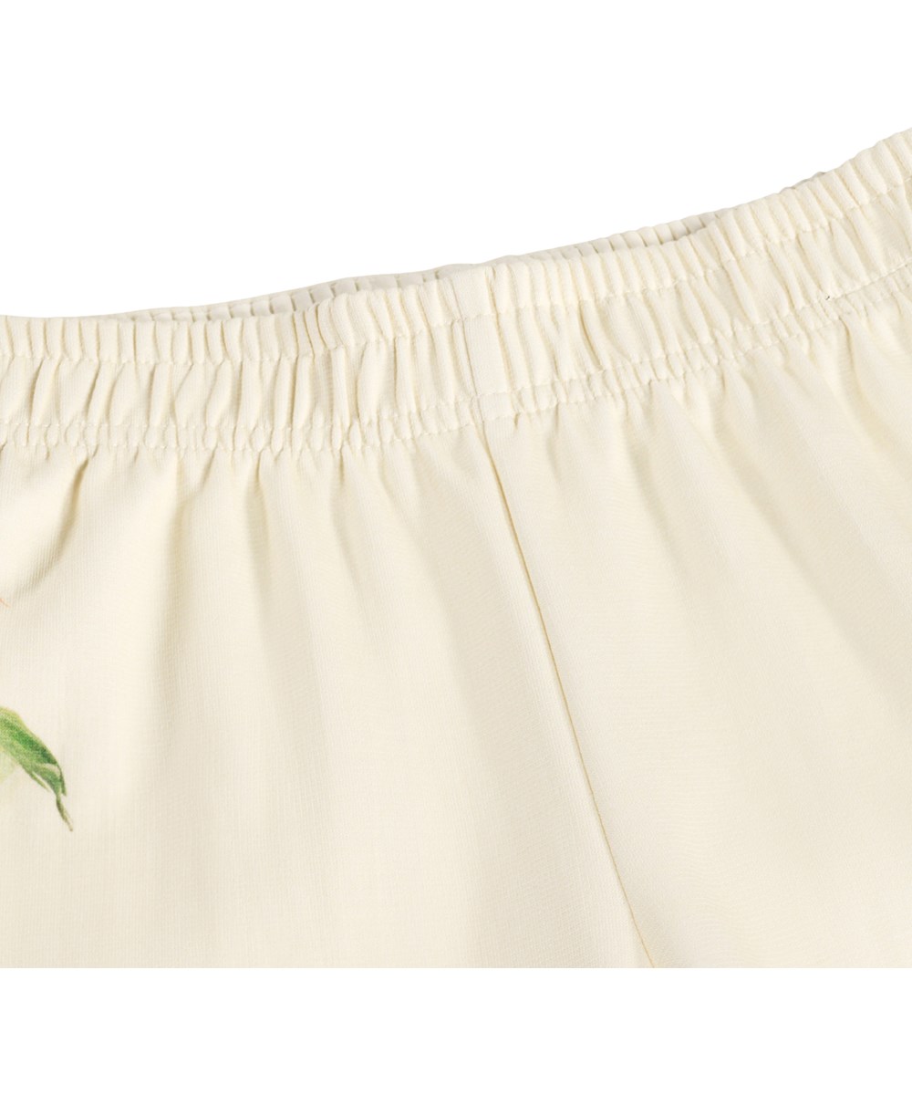 Aurita - Flora Collector - Gebroken witte jerseybroek met een bloemenprint gemaakt van biologisch katoen 