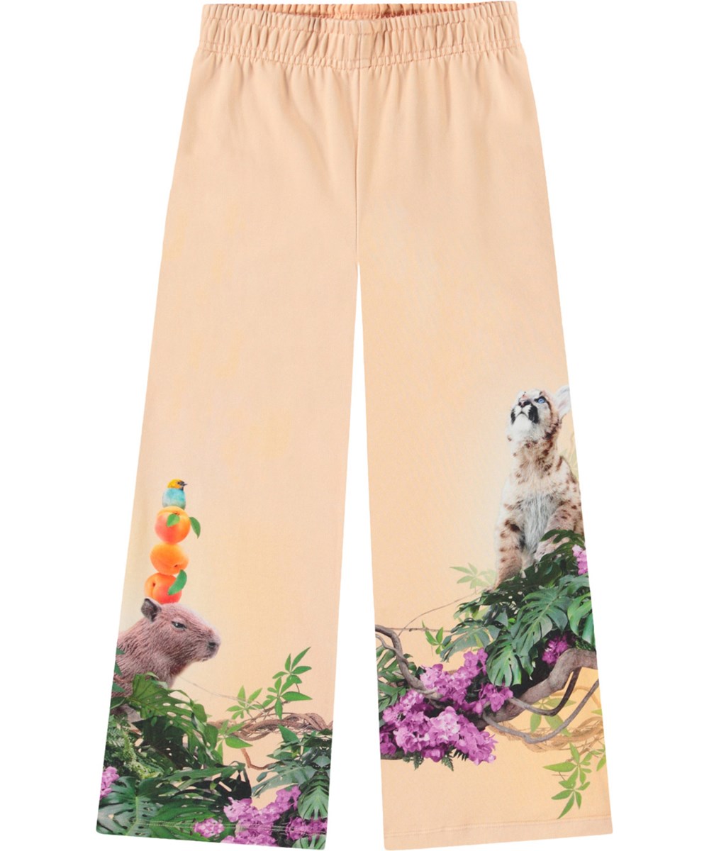 Aurita - Pumatastic - Lichtoranje kinderbroek van biologisch katoenen jersey met een jungle dierenprint.