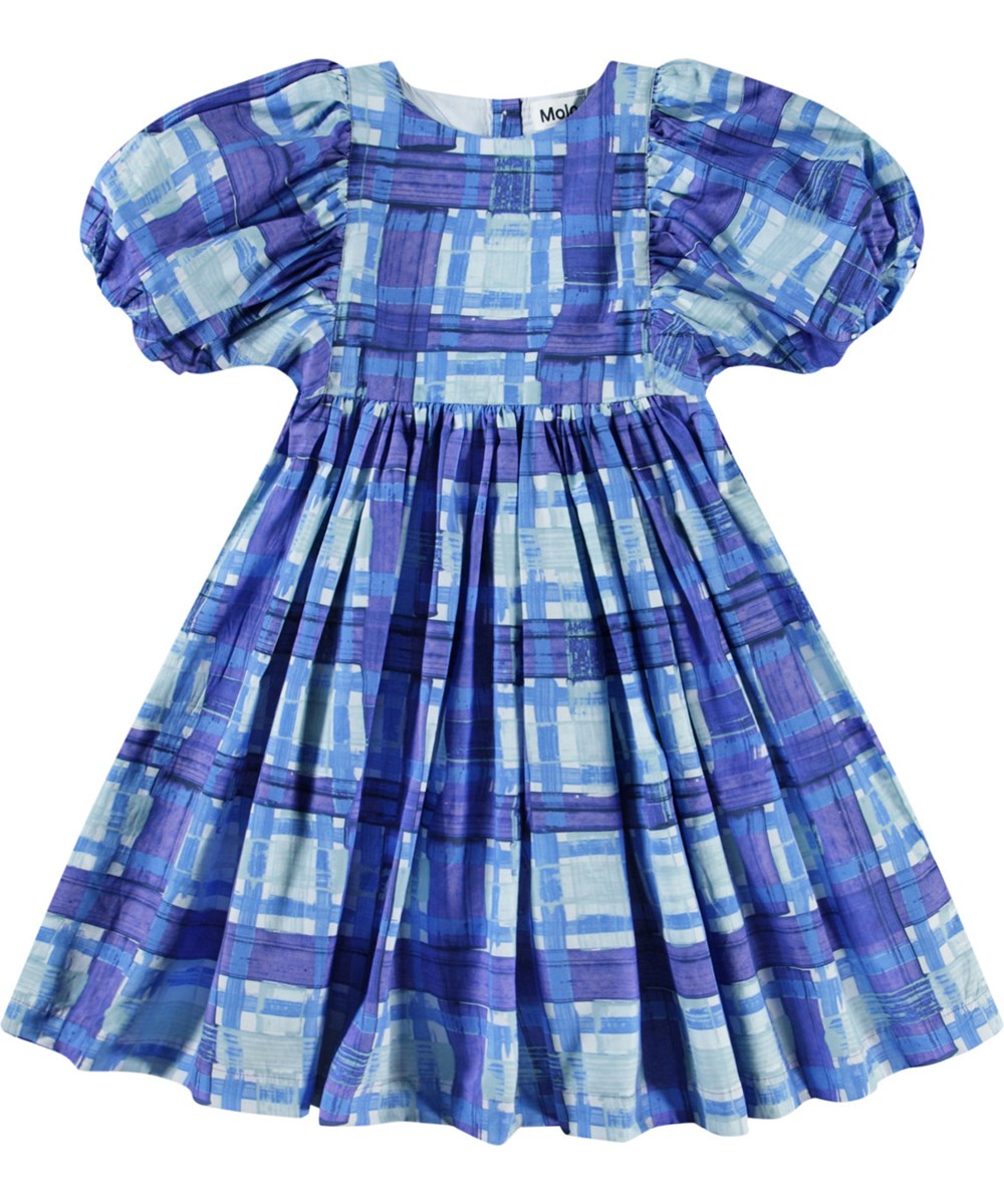 Calyita - Blue Checks - Geblokte kinderjurk in verschillende kleuren blauw van biologisch katoen met een ronde hals.