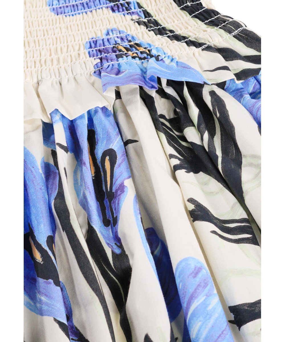 Chipie - Painted Crocus - Witte kinderjurk met een bloemenprint gemaakt van biologisch katoen 