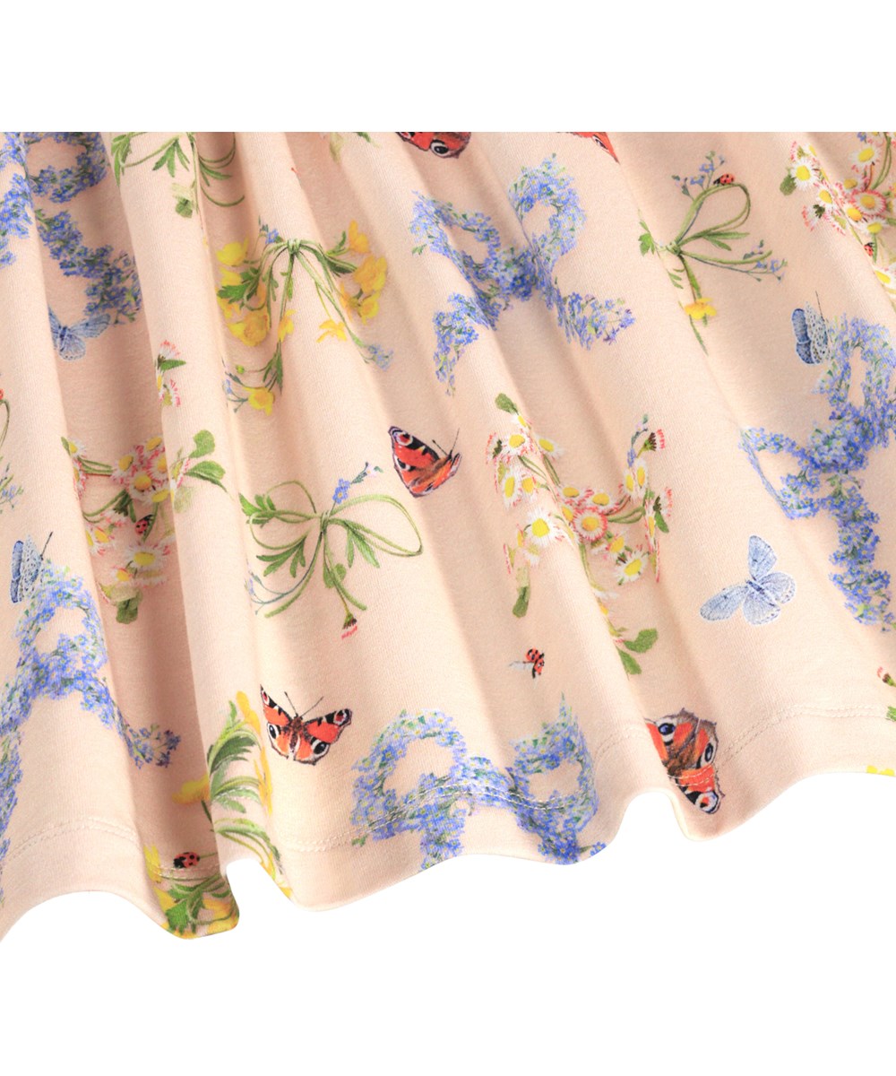 Cissa - Flowerbows - Roze kinderjurk met een bloemenprint gemaakt van biologisch katoen 