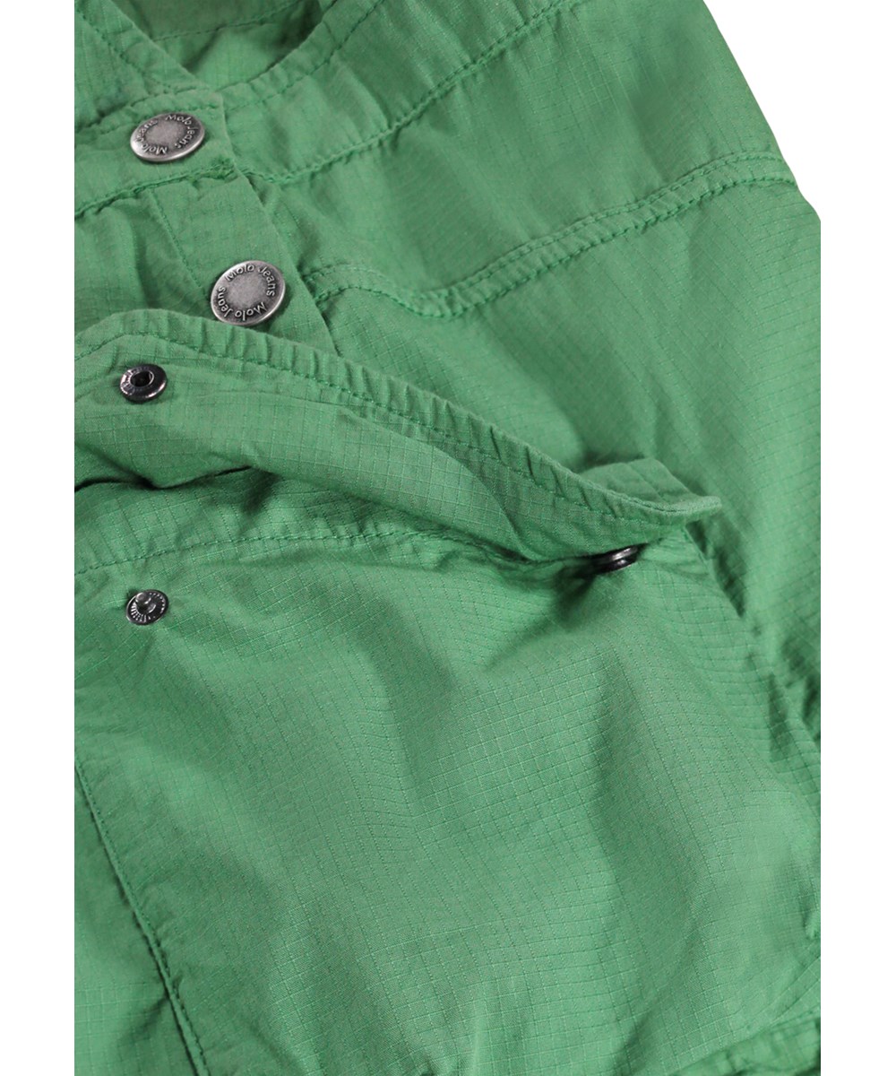 Clarice - Groovy Green - Groene kinderjurk met cargozakken gemaakt van duurzaam biologisch katoen 