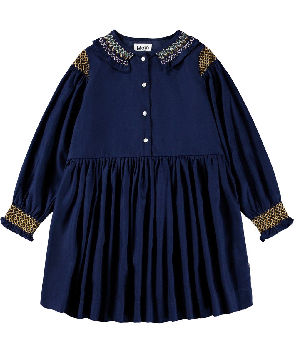 Cyrille - Galaxy Blue - Kinderjurk gemaakt van donkerblauwe viscose met lange mouwen en kleurrijke smok details.