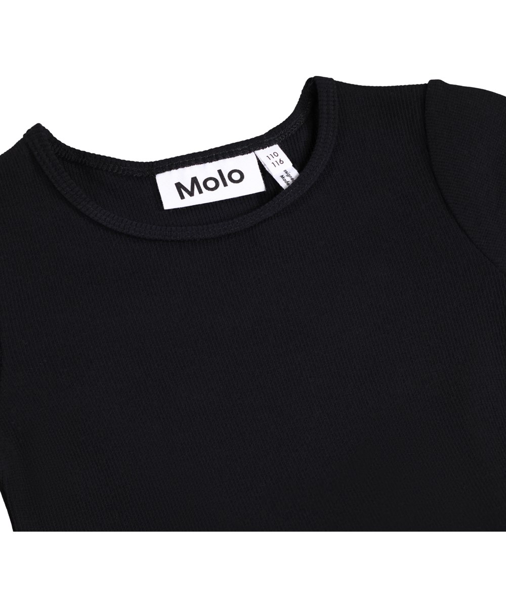 Cyrus - Black - Zwarte kinderjurk met lange mouwen en een zwarte tule rok met lovertjessterren.