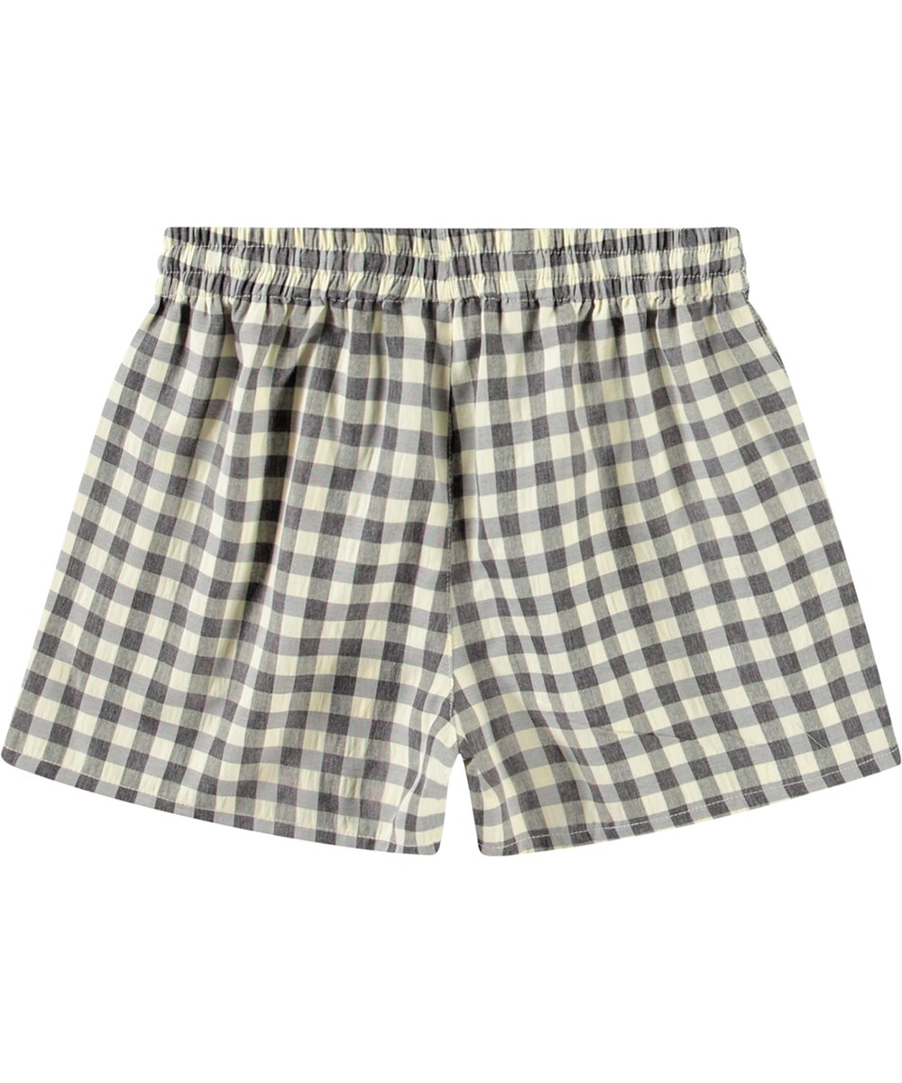 Addie - Sun Check - Geblokte kindershort in zwart en wit.