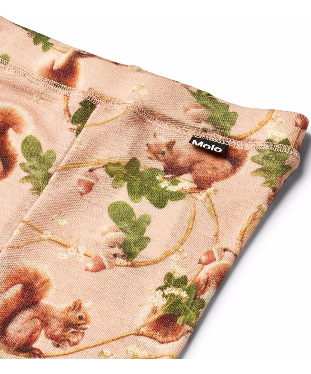 Nadine Wool - Squirrel Harmony - Roze kinderlegging gemaakt van merinowol met eekhoornprint.