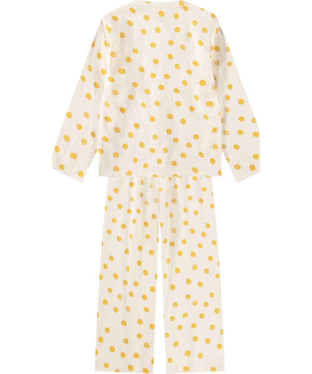 Lin - Sunshine Night - Gebroken witte kinderpyjama met een print gemaakt van biologisch katoen 