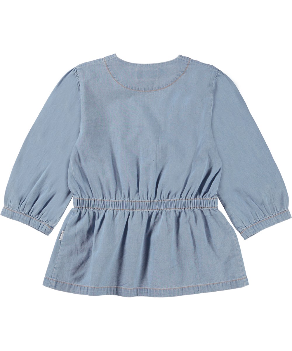 Rikki - Light Chambrey - Blauwe wikkelblouse in biologische katoen