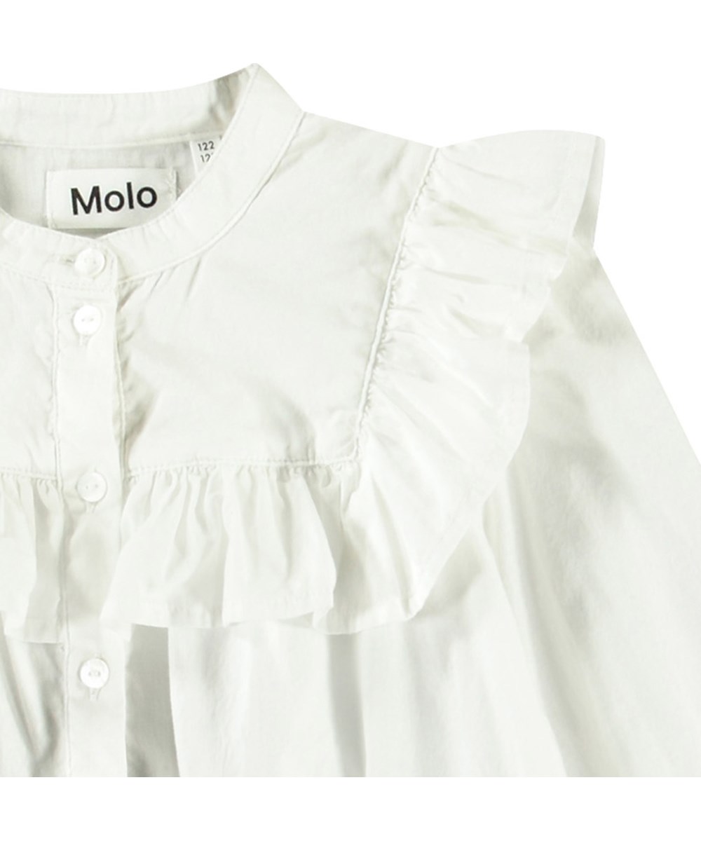 Rozetta - Crisp White - Witte kinderblouse van biologisch katoen met mandarijnkraag en ruches.