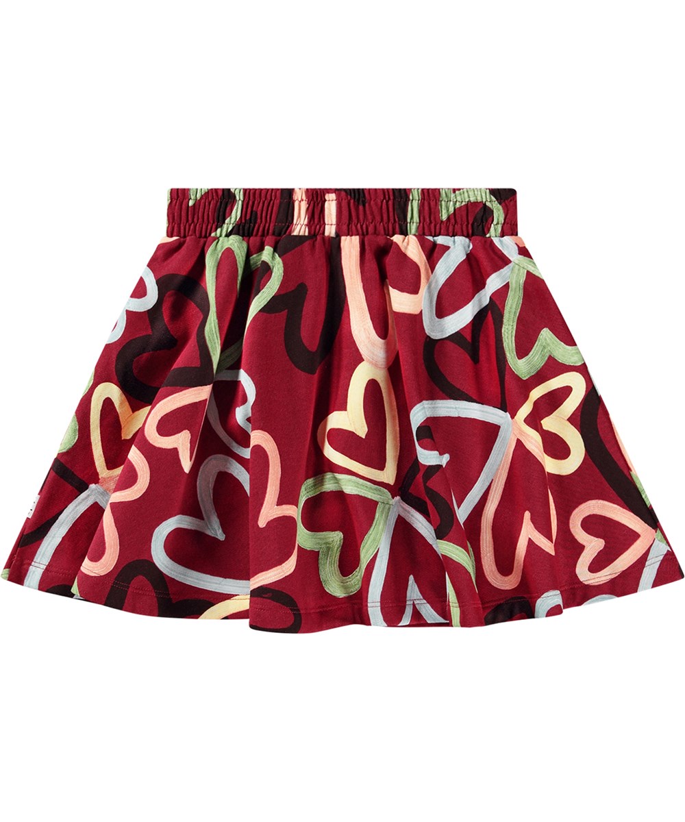 Barbera - Flutters Of Love - Comfortabele rode biologische katoenen rok met elastische tailleband en een all-over hartjesprint.