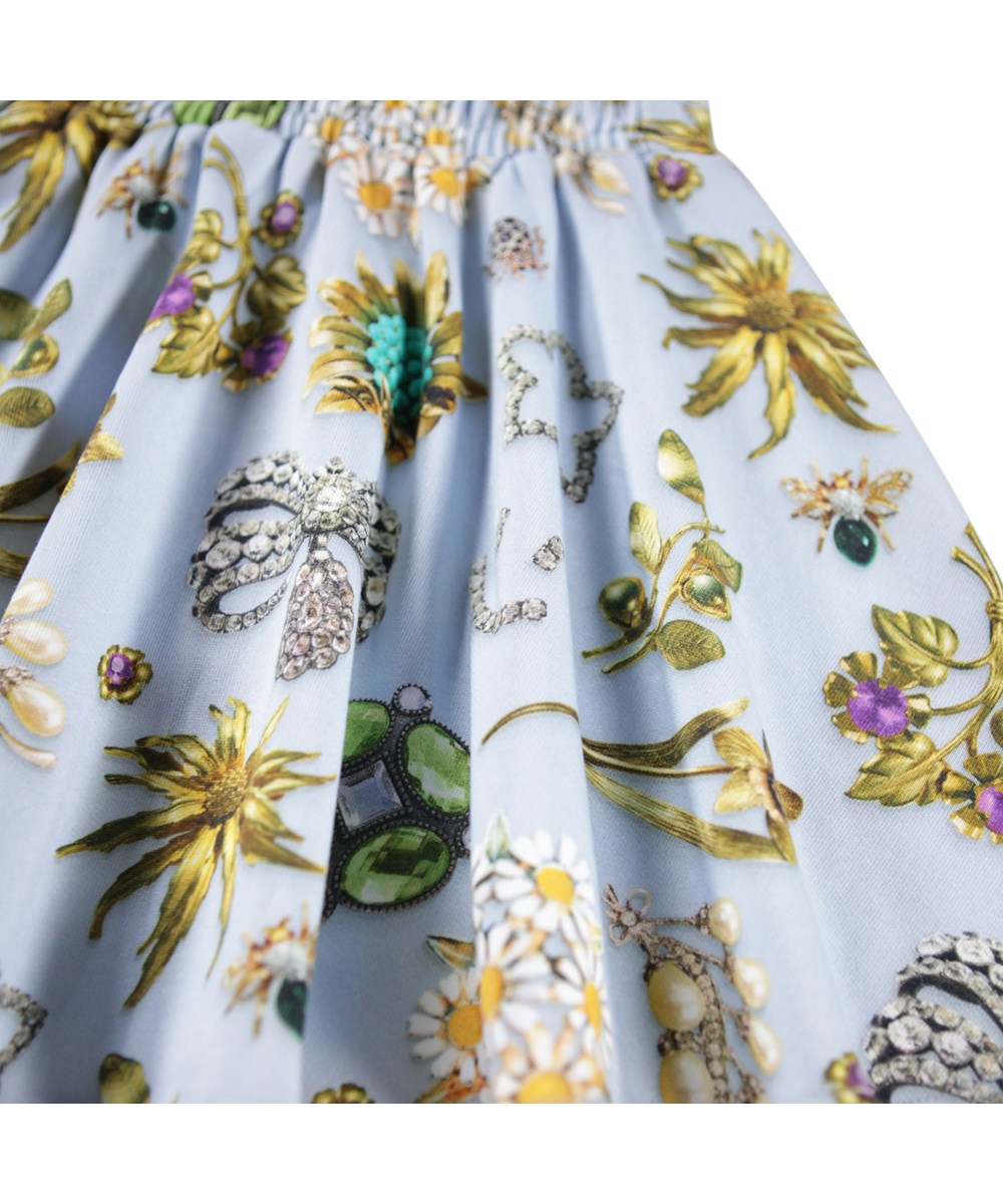 Barbera - Royal Bling - Lichtblauwe kinderrok gemaakt van biologisch katoen met een print van kleurrijke tulpen.