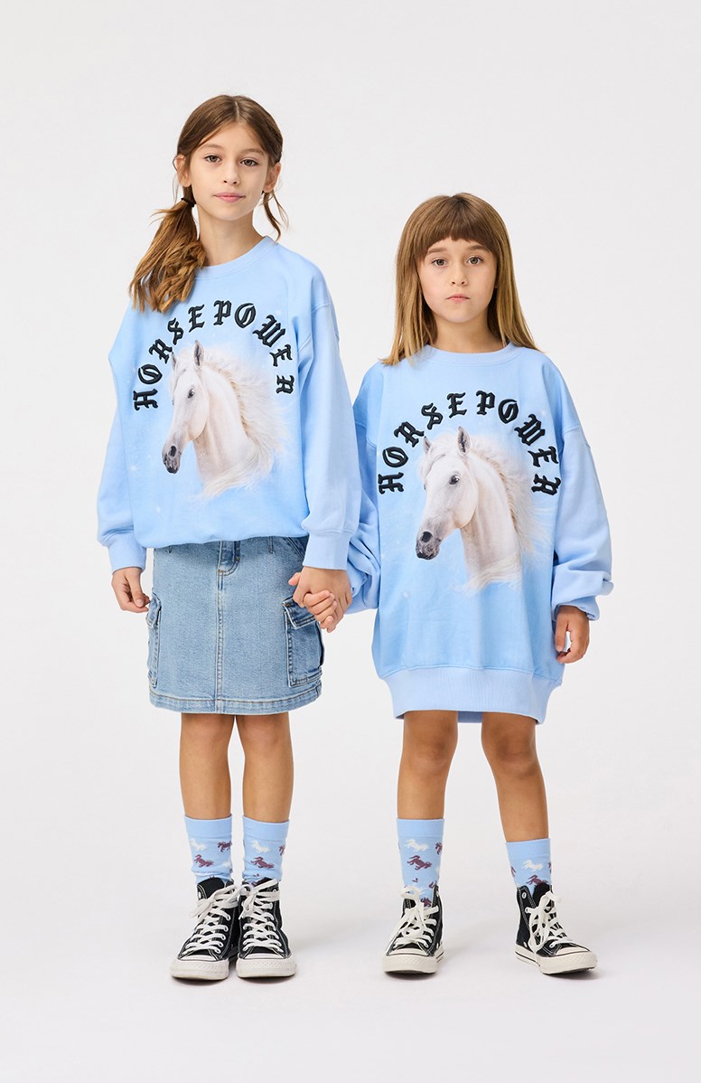 Belli - Distressed Washed - Blauwe kinderspijkerrok van biologisch katoen met cargozakken aan de zijkant.