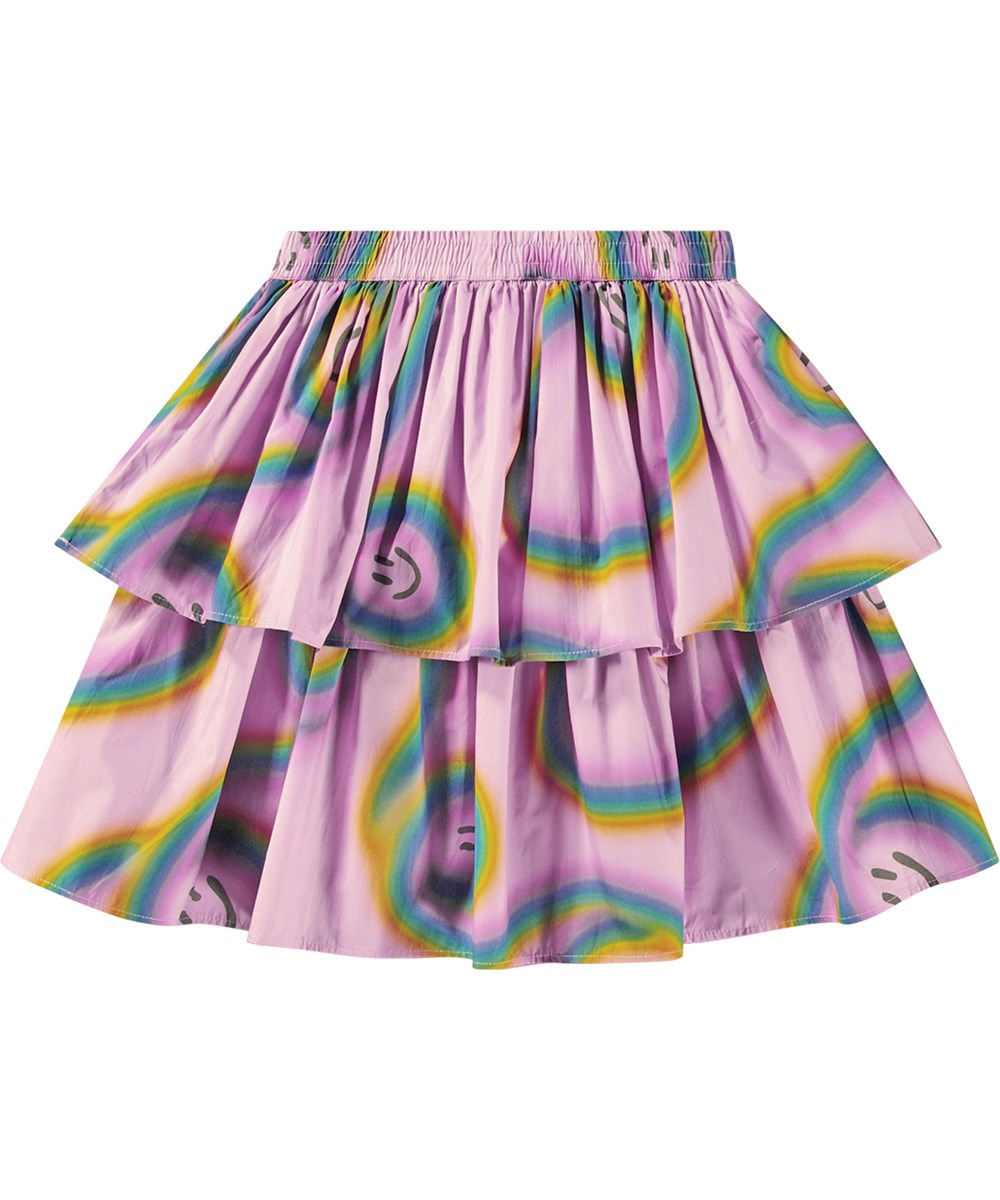 Brigitte - Accelerating Smiles - Midi-roze rok van biologisch katoen met zwevende regenboogprint.