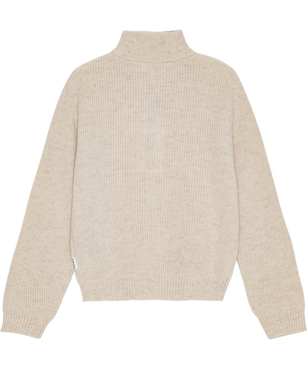 Gretta - Whisper Pink - Zachte beige wollen trui in een ruimvallende pasvorm met hoge kraag en rits.