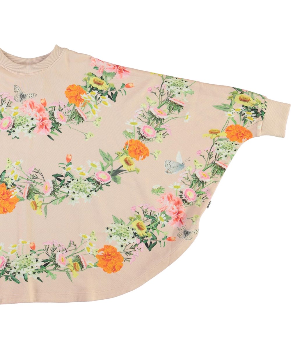 Marcella - Garlands - Roze poncho met bloemenprint