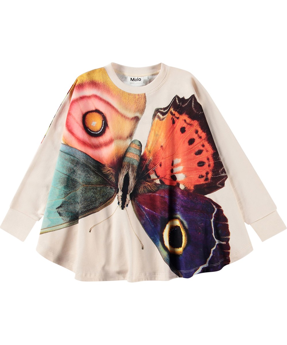 Marcella - Giant Butterfly - Off-white oversized poncho gemaakt van biologisch katoen met een vlinderprint.