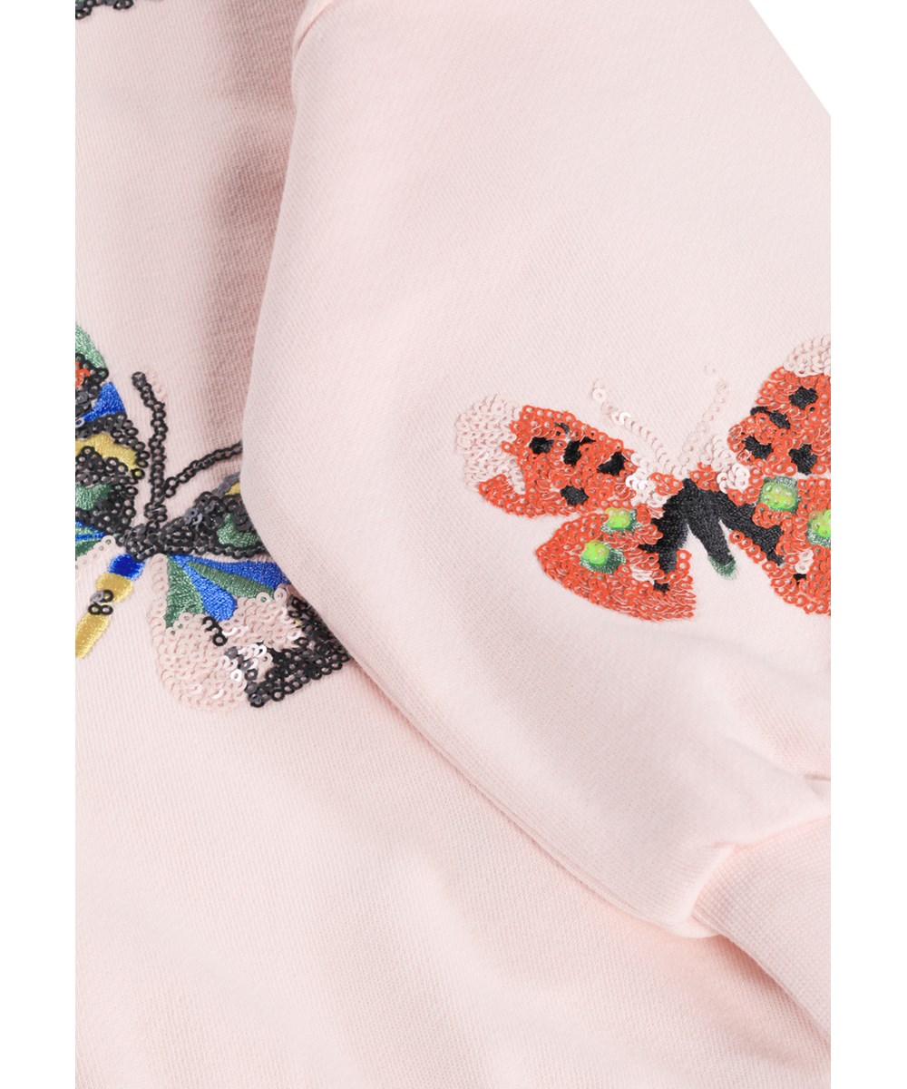 Marika - Cloud Pink - Roze kindersweater met geborduurde pailletten gemaakt van biologisch katoen