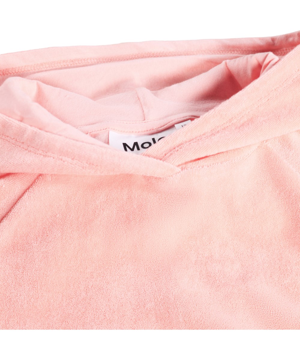 Minelli - Peach Bud - Perzikkleurige kinderhoodie gemaakt van biologisch katoenen badstof