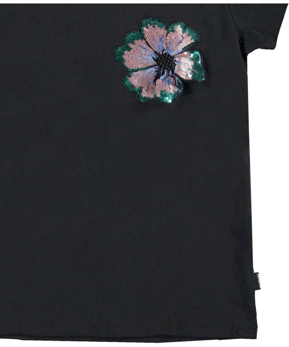 Ranva - Black - Zwarte t-shirt met lovertjesbloem