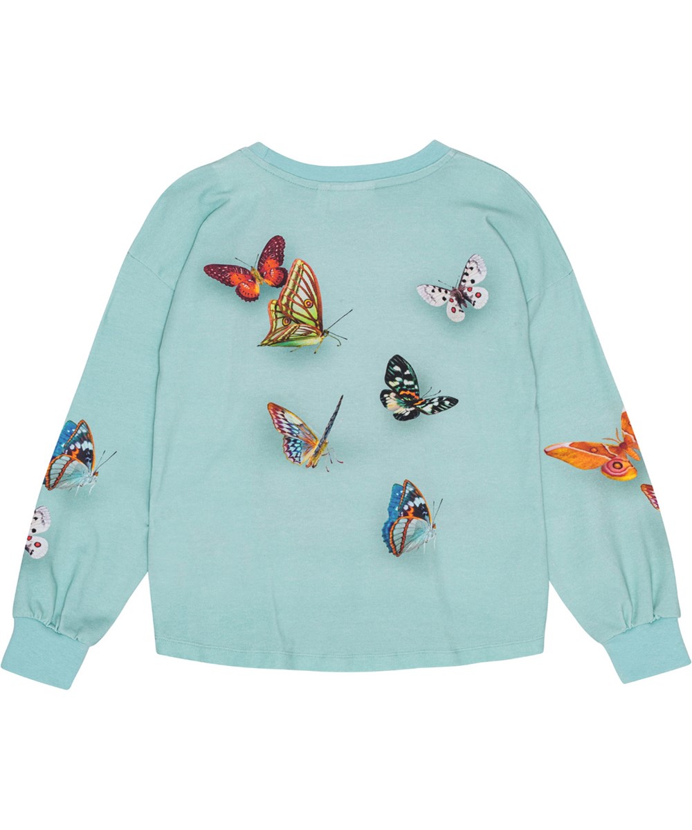 Reniza - Bonjour - Lichtblauwe biologische katoenen trui in een ruime pasvorm met geribbelde boorden.