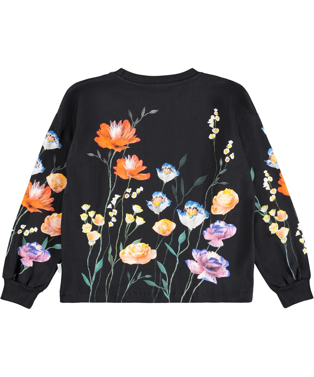 Reniza - Flower Picking - Zwarte longsleeve voor kinderen gemaakt van zacht biologisch katoen met ribboorden rond de mouwen en hals en een print van kleurrijke papieren bloemen.