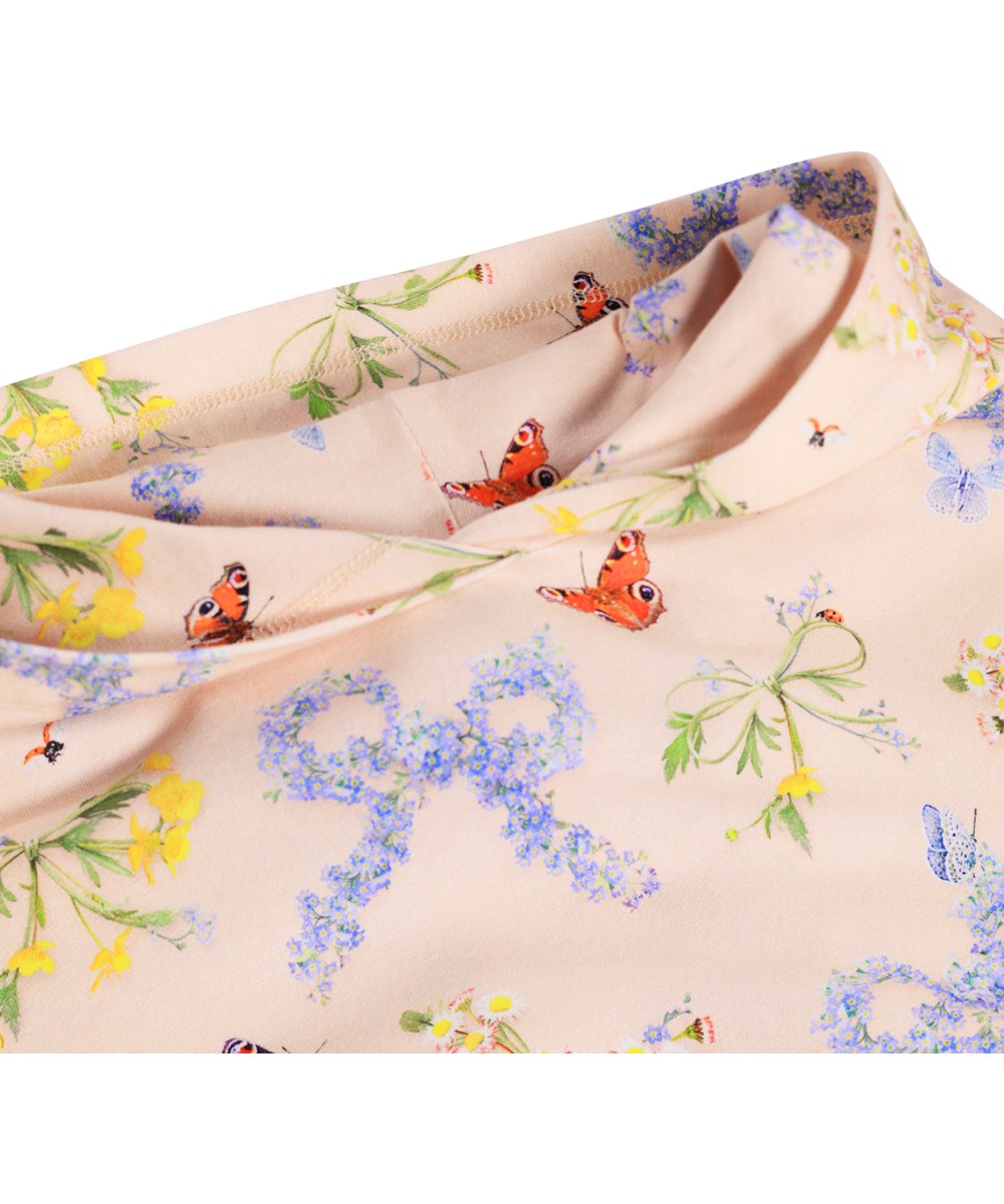 Rhona - Flowerbows - Roze kinderhoodie met een bloemenprint gemaakt van biologisch katoen 