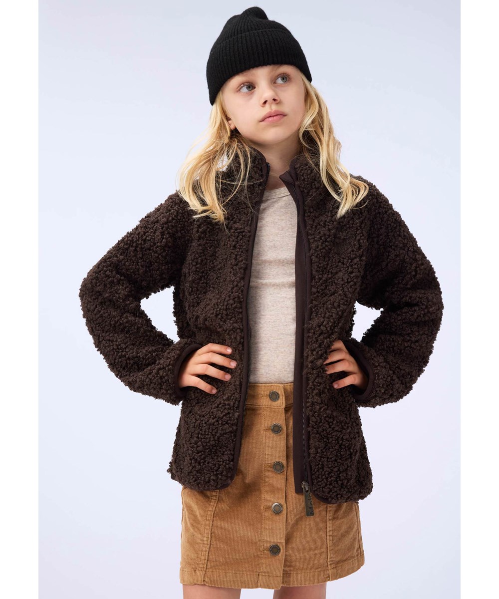 Rihanna Wool - Oatmeal Melange - Beige gemêleerde longsleeve voor kinderen gemaakt van zachte merinowol in een aansluitende pasvorm met een ronde hals en babylock-details rond de mouwen en taille.