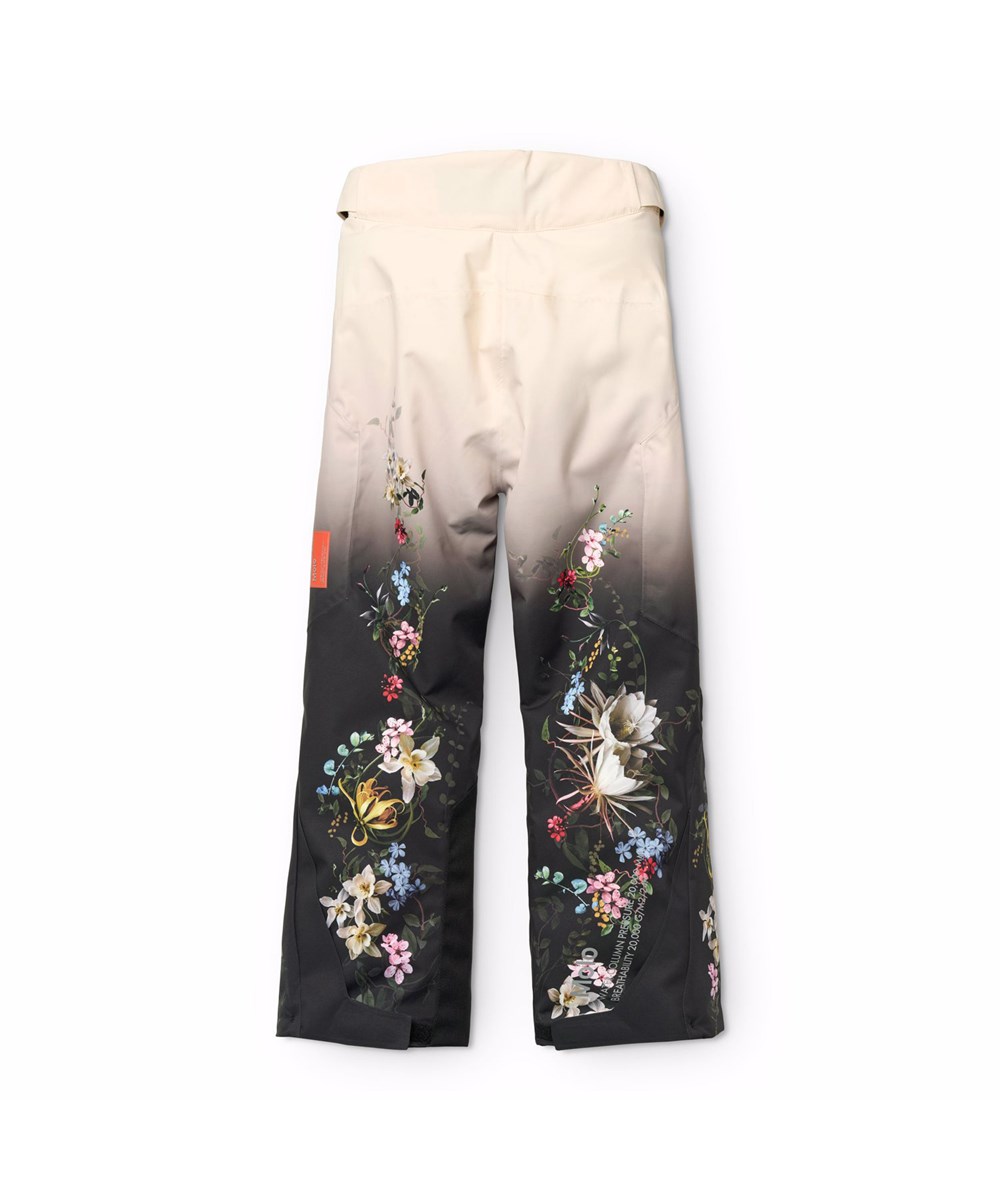 Jump Pro - Faded Paisley - Wind- und wasserdichte Skihose für Kinder mit einem Druck von bunten Blumen, die zum hellen und dunklen Farbverlauf im Hintergrund passen. Sie besteht aus recyceltem Polyester und ist mit 3M™ Thinsulate™ gefüttert.