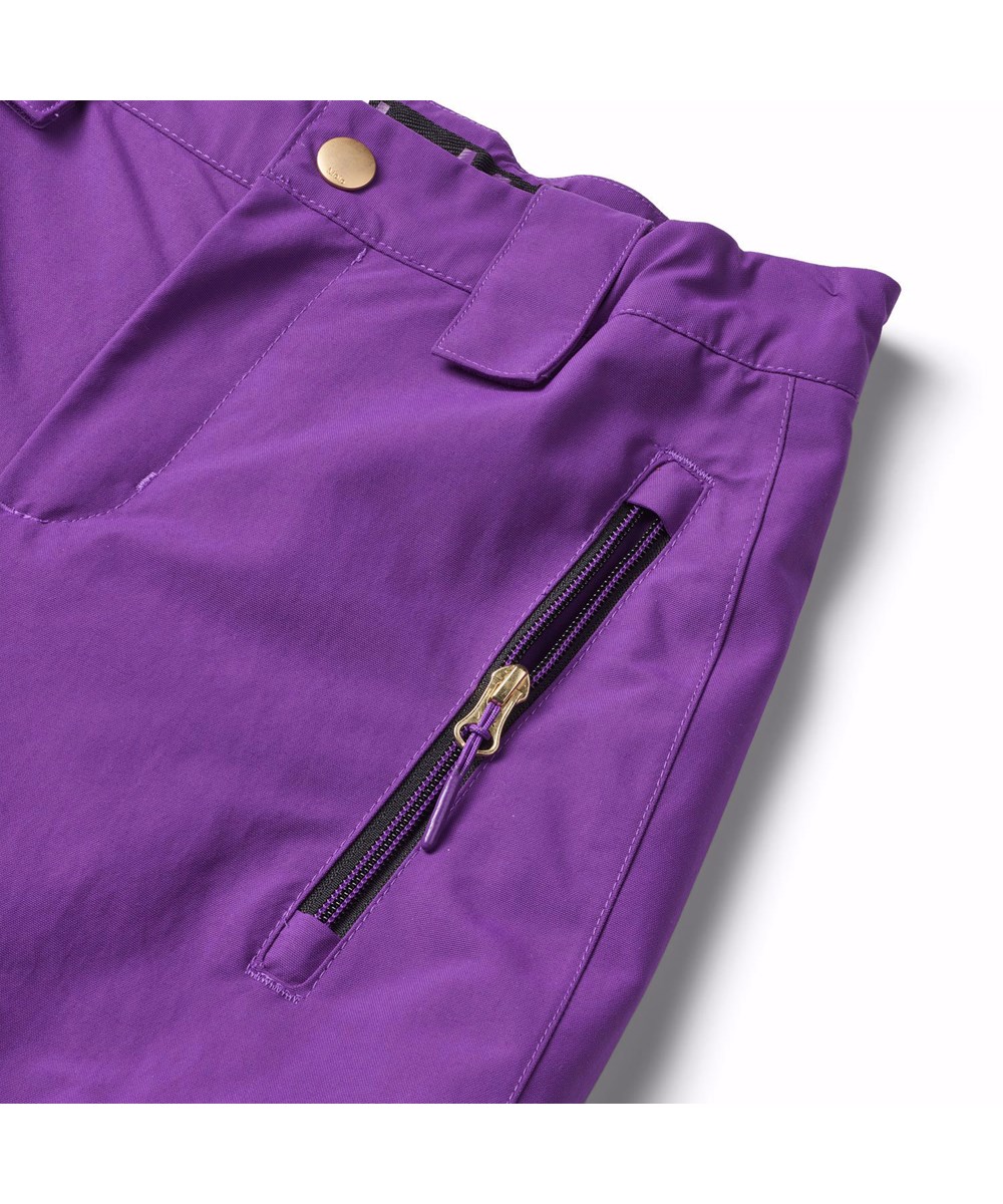 Jump Pro - Warm Purple - Lila wind- und wasserdichte Hosen für Kinder aus recyceltem nylon.