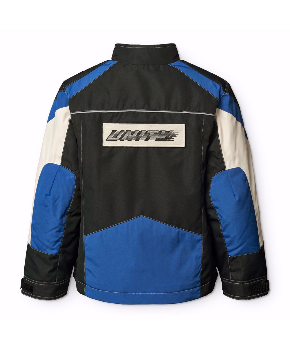 Haddix - Black - Jacken für Kinder in Schwarz, Blau und Off-Weiß, inspiriert von der Motocross-Welt, mit Klettverschluss-Patches auf der Brust und dem Rücken.