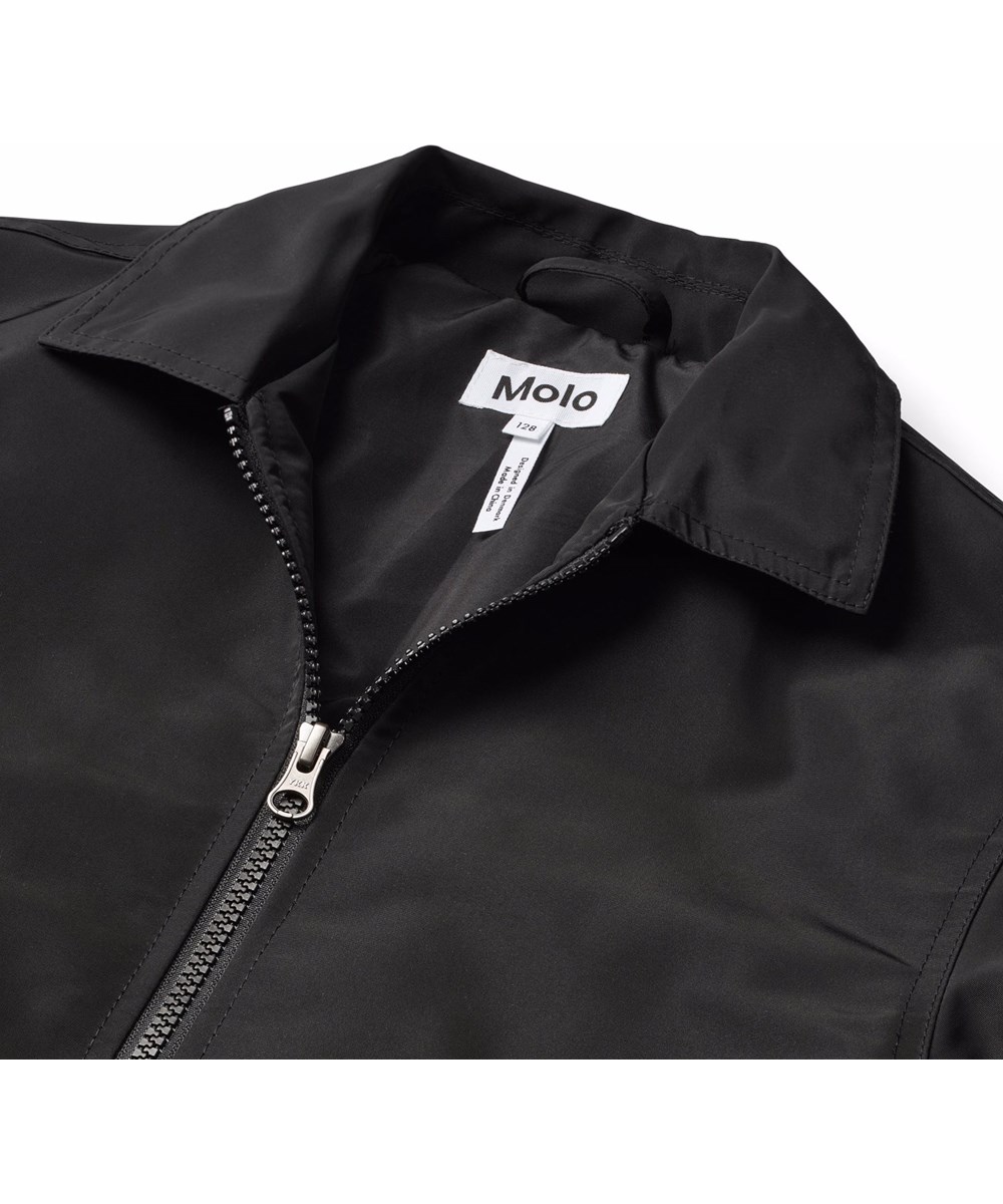 Hotson - Hot - Schwarze Jacke für Kinder mit burgunderroten Flammen aus glänzendem Polyester.