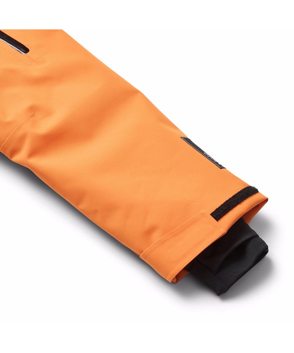 Alpine - Lava Orange - Wind- und wasserdichte orangefarbene Winterjacke für Kinder aus recyceltem Polyester, gefüttert mit 3M™ Thinsulate™.