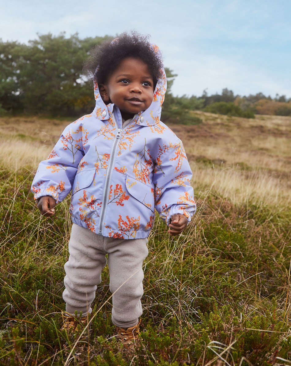 Honor - Cosmic Mimosa - Recycelte helllila Winterjacke mit orangefarbenen Zweigen