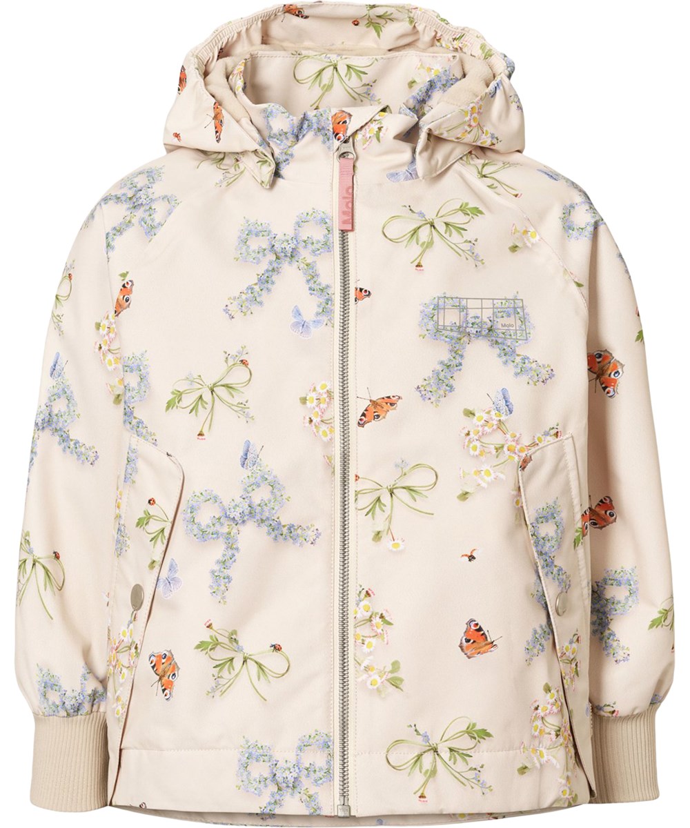 Hoplas - Floral Bows - Wind- und wasserdichte beige Jacke für Kinder aus recyceltem Polyester.
