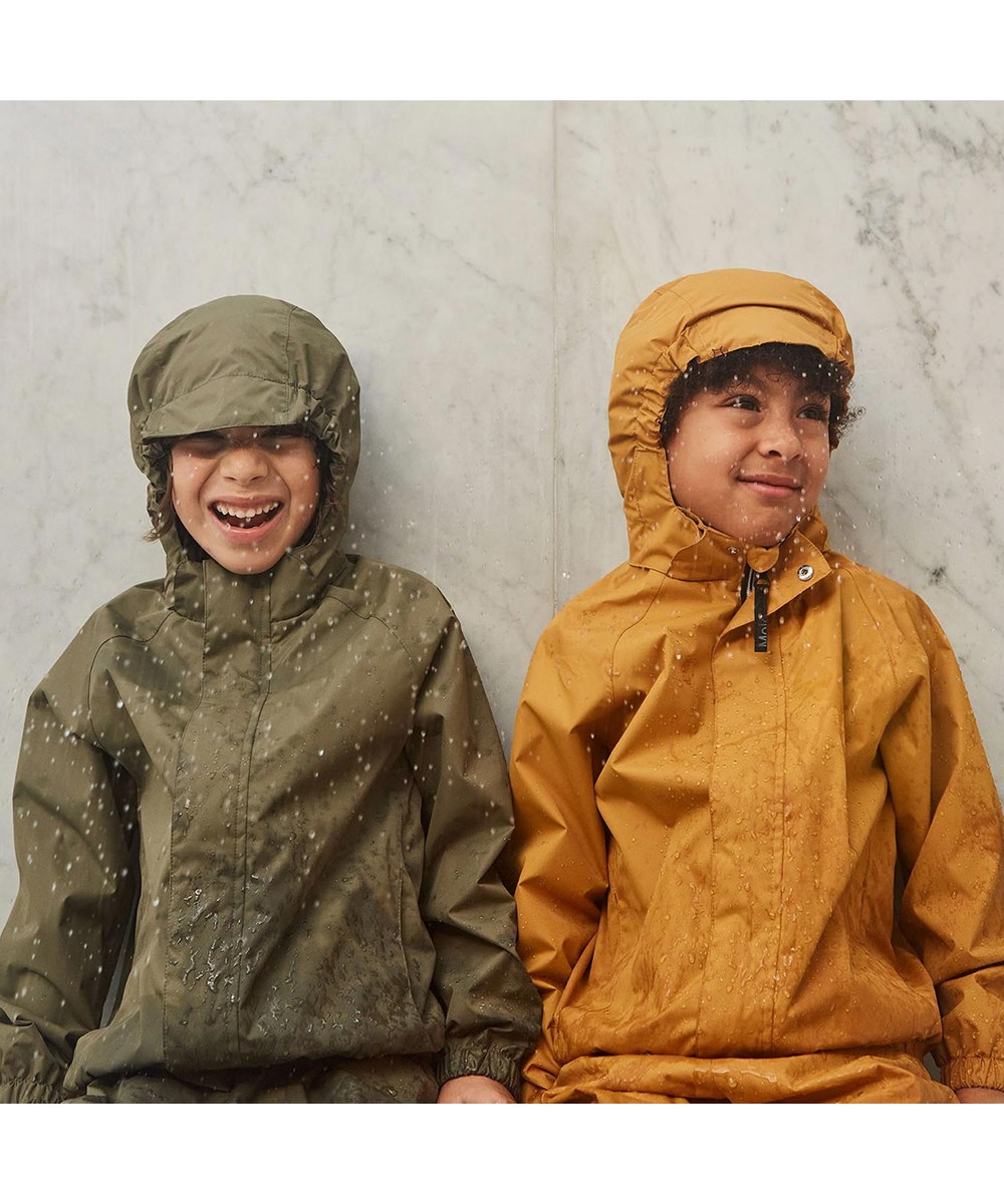 Waiton - Honey - Goldene Regenjacke mit Sternreflektor